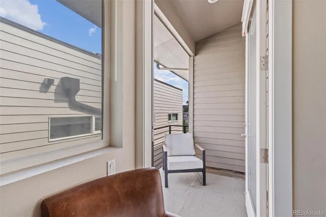 a view of a house with a lounge chair