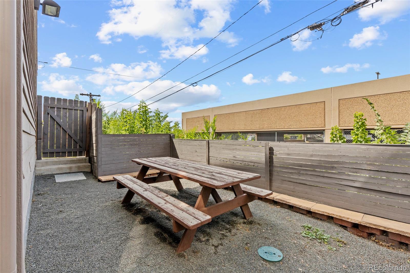 3553 South Emerson Street, Unit 2 Englewood, CO 80113 - Photo 31 of 31 a view of a bench in a hall