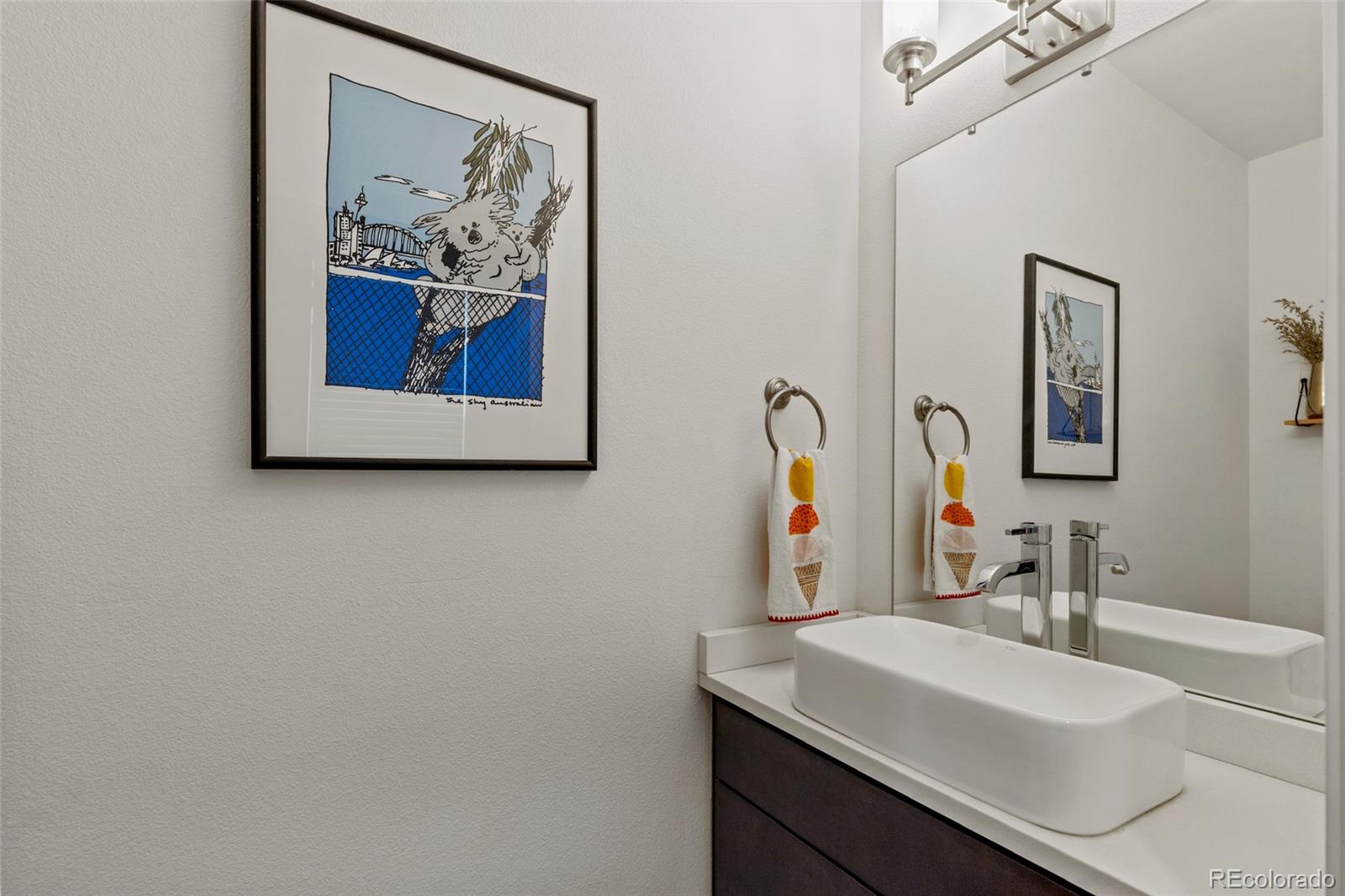 3553 South Emerson Street, Unit 2 Englewood, CO 80113 - Photo 10 of 31 a bathroom with a sink and a mirror