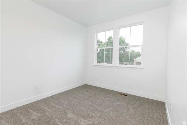314 North 200 West Logan, UT 84321 - Photo 29 of 37 Spare room with carpet and baseboards