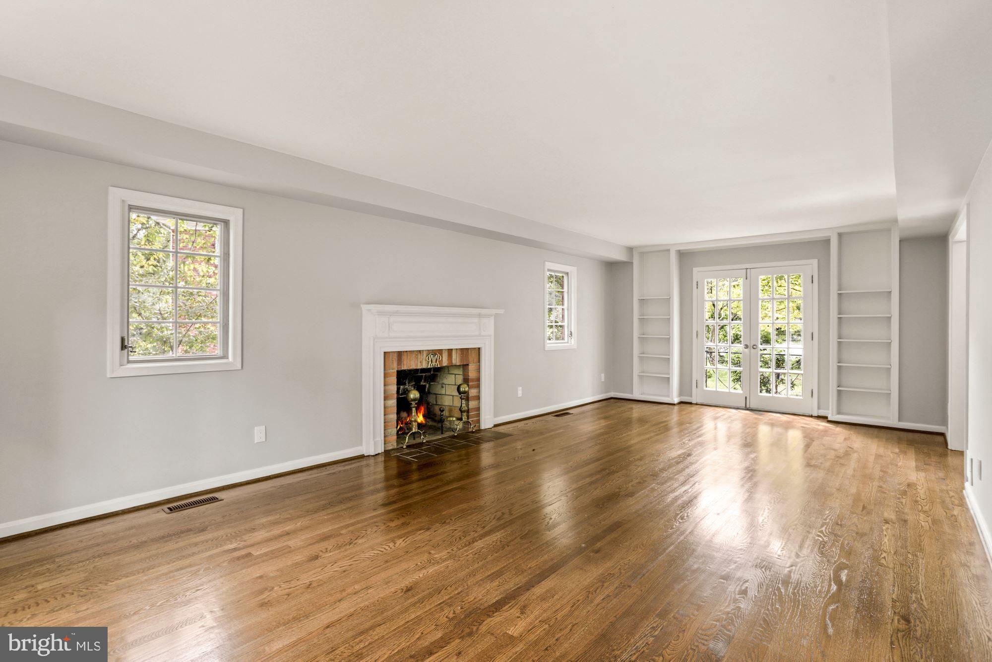 1011 Shipman Lane McLean, VA 22101 - Photo 9 of 43 Family room with fireplace