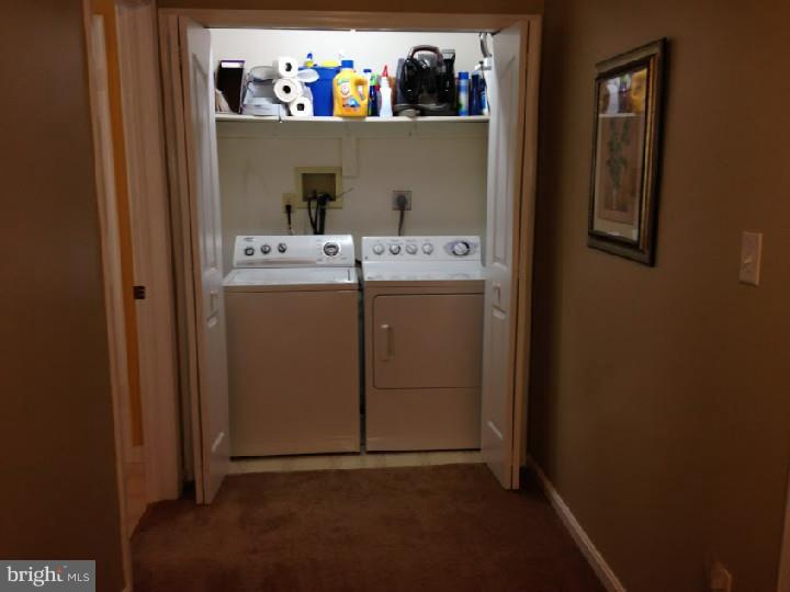 696 Guernsey Road South Landenberg, PA 19350 - Photo 17 of 25 a utility room with dryer and washer