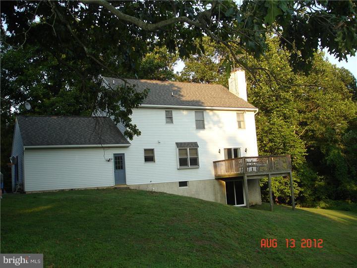 696 Guernsey Road South Landenberg, PA 19350 - Photo 3 of 25 a front view of house with yard and green space