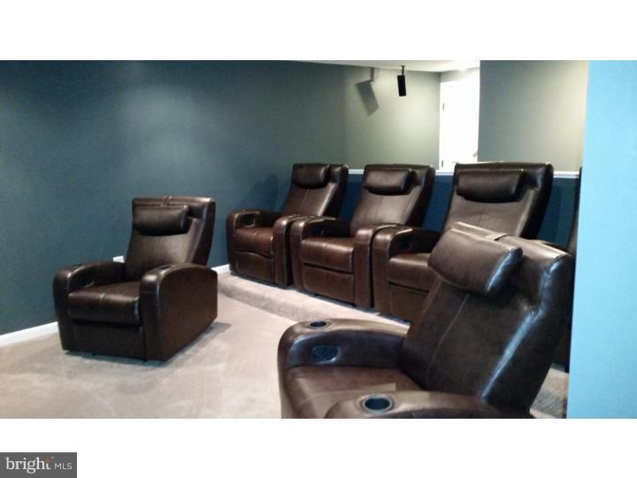 696 Guernsey Road South Landenberg, PA 19350 - Photo 22 of 25 a living room with furniture and a couch