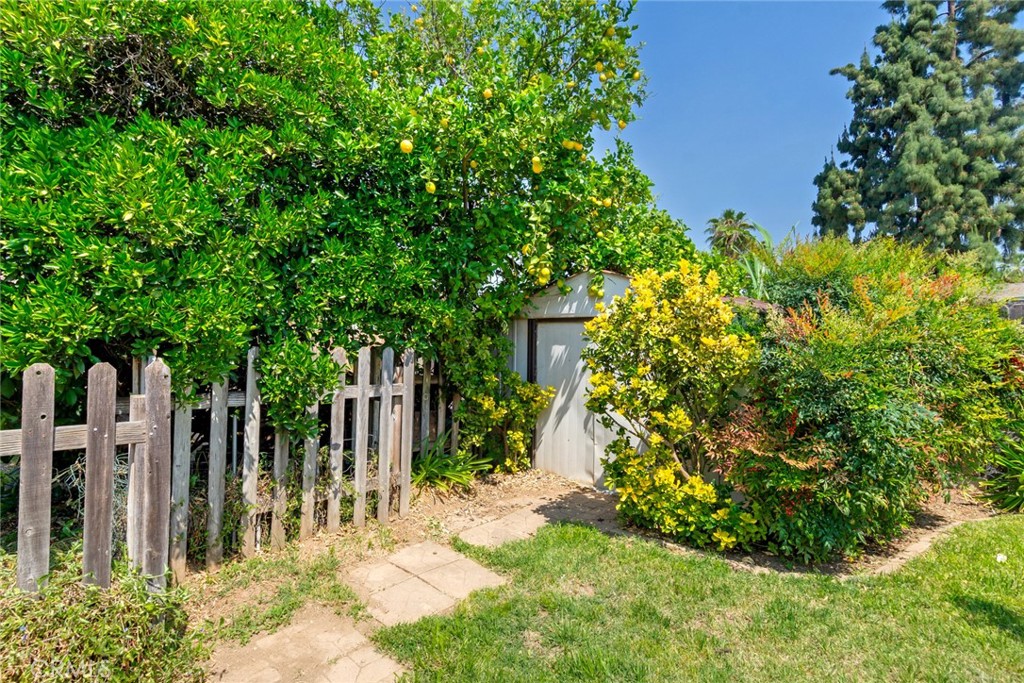 9579 Hampshire Street Rancho Cucamonga, CA 91730 - Photo 24 of 25 a view of a backyard with wooden fence