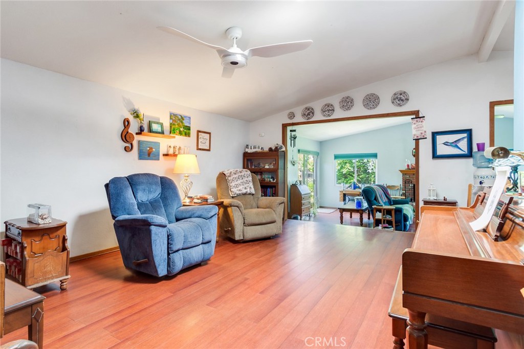 9579 Hampshire Street Rancho Cucamonga, CA 91730 - Photo 4 of 25 a living room with furniture and a wooden floor