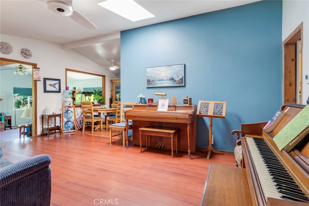 9579 Hampshire Street Rancho Cucamonga, CA 91730 - Photo 5 of 25 a living room with furniture and a piano