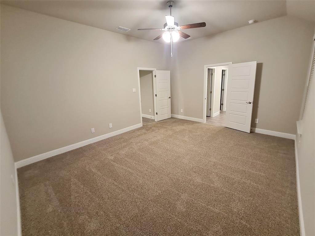 1604 Buzzard Road Denton, TX 76205 - Photo 9 of 22 Spacious Master Bedroom 5 with Master Bath and Walk in Closet.