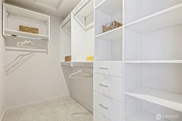 a bathroom with a sink double vanity and a mirror