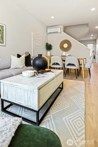 a kitchen with a table and chairs in it