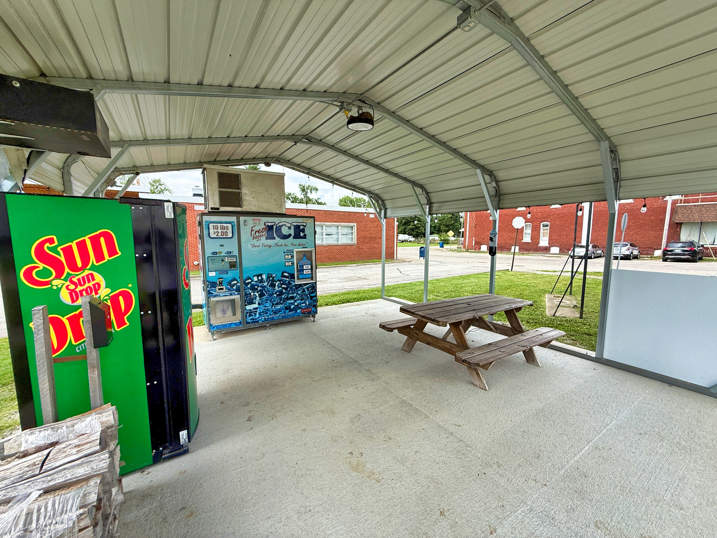 300 Front Street Xenia, IL 62899 - Photo 8 of 21 an outdoor sitting area with couch and table