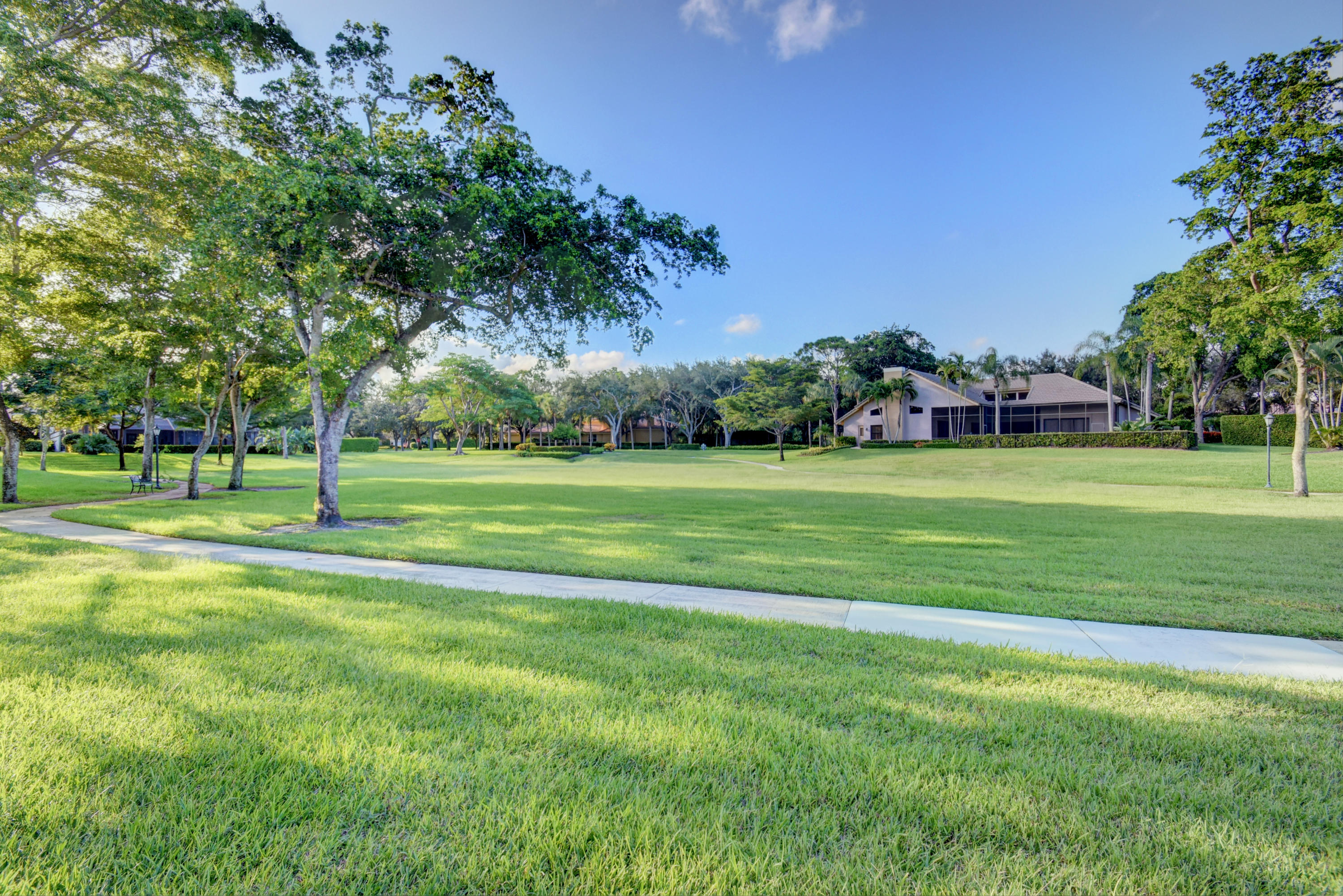 2375 Northwest 41st Street Boca Raton, FL 33431 - Photo 36 of 38 a view of a park with trees and a houses