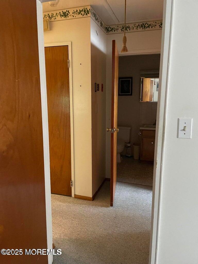 7 Walnut Street, Unit C Toms River, NJ 08757 - Photo 20 of 28 a view of a hallway with closet and a bathroom