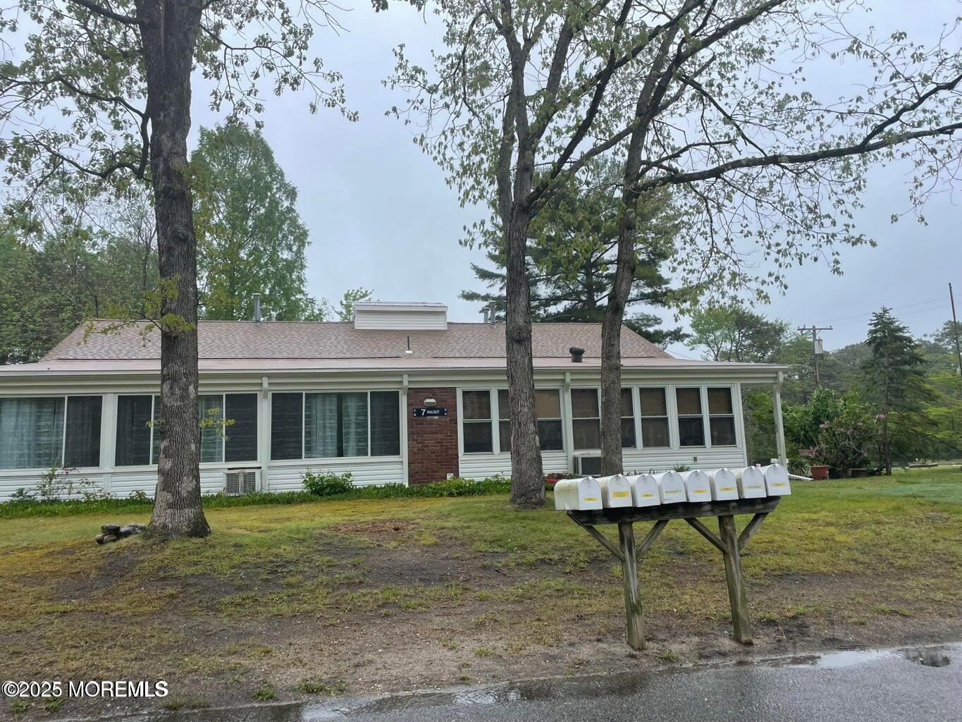 7 Walnut Street, Unit C Toms River, NJ 08757 - Photo 26 of 28 a house view with a garden space