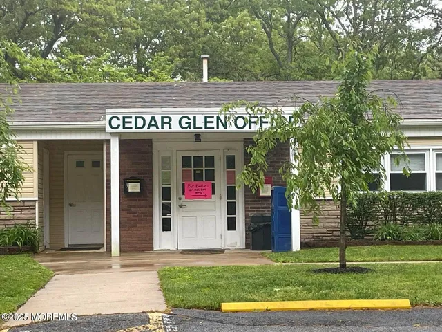 a view of a street with stores