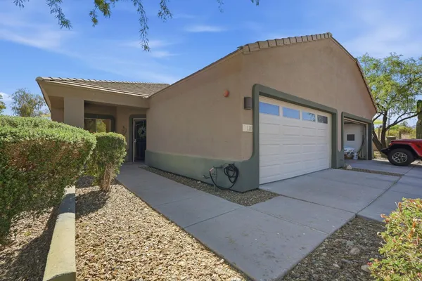 a view of a house with a garage