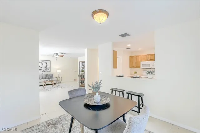 a view of kitchen with breakfast area