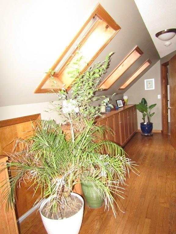 1300 Burts Pit Road Northampton, MA 01062 - Photo 20 of 39 a living room with a couch and wooden floor