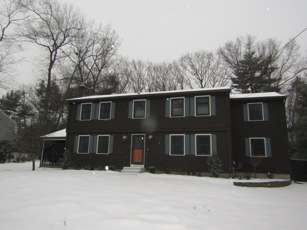 1300 Burts Pit Road Northampton, MA 01062 - Photo 2 of 39 a front view of a house with a yard covered in snow