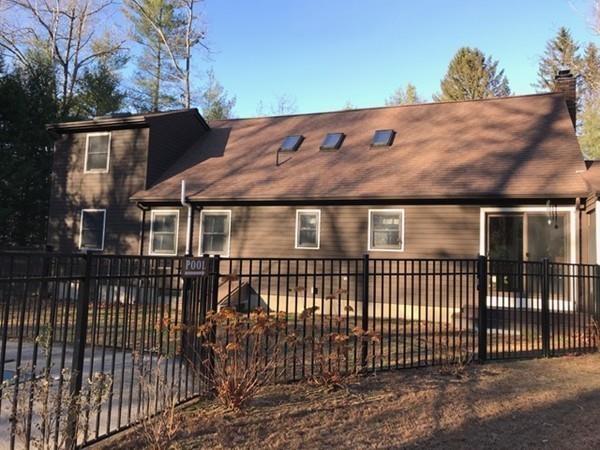 1300 Burts Pit Road Northampton, MA 01062 - Photo 33 of 39 a view of a brick house with wooden fence