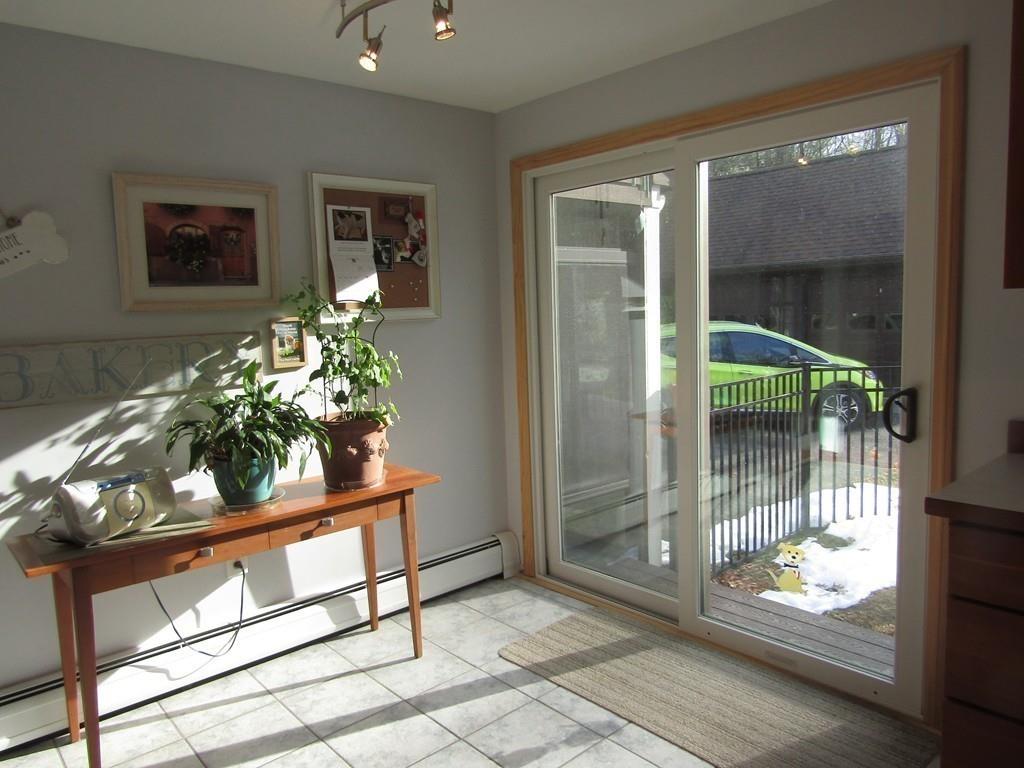 1300 Burts Pit Road Northampton, MA 01062 - Photo 5 of 39 a room with glass door and glass door