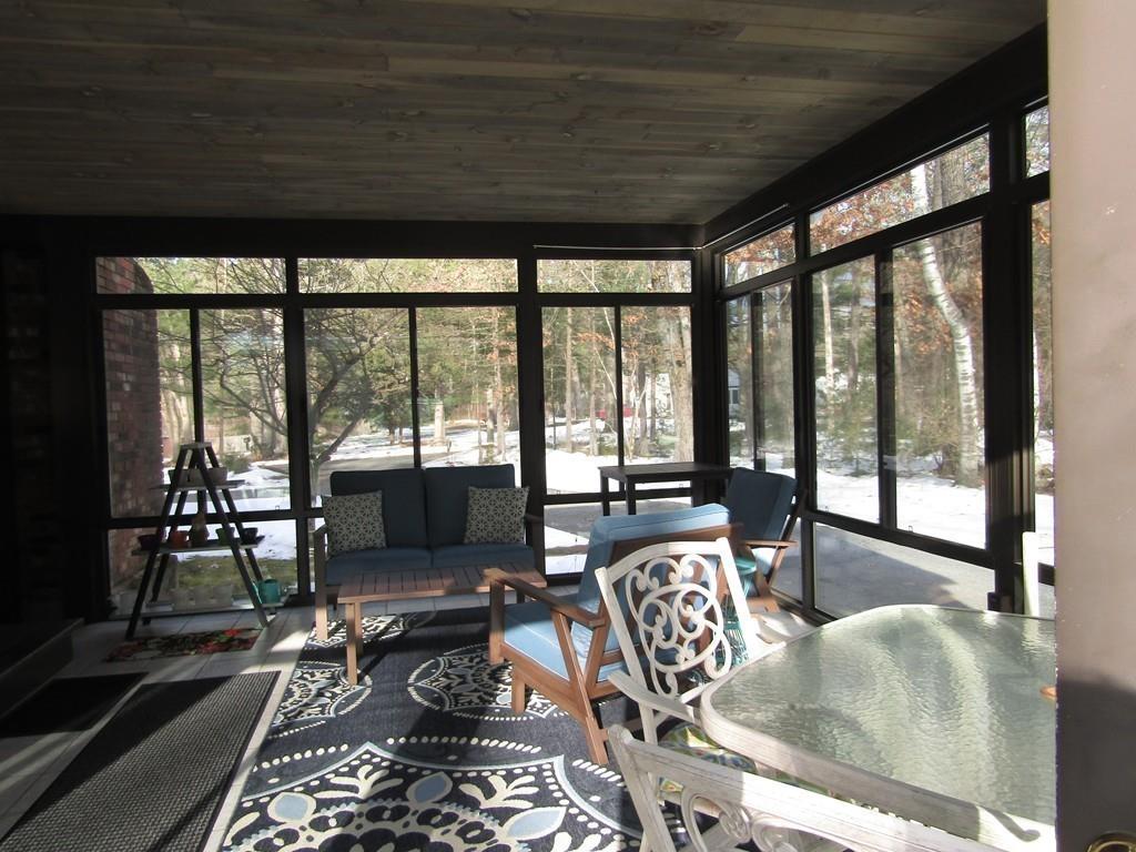 1300 Burts Pit Road Northampton, MA 01062 - Photo 10 of 39 a living room with furniture and floor to ceiling windows