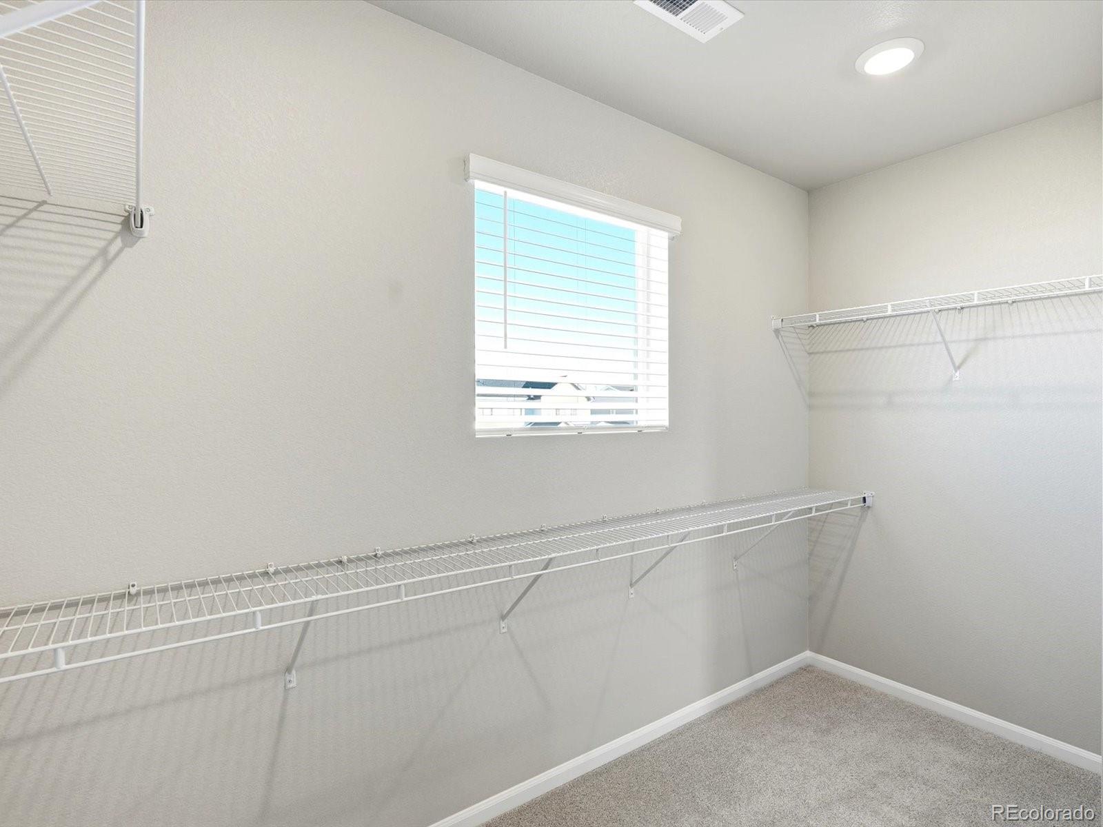 7317 West 27th St Road Greeley, CO 80634 - Photo 24 of 28 a view of a room that has a window in it