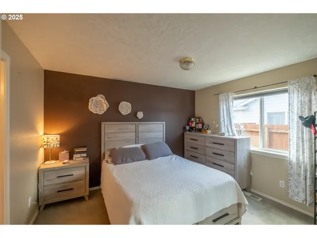 a bathroom with a shower curtain and a curtain
