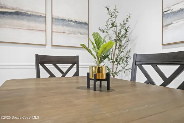 a bedroom with a bed and a night stand