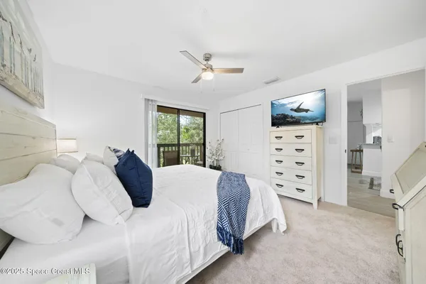 a view of a balcony with chairs