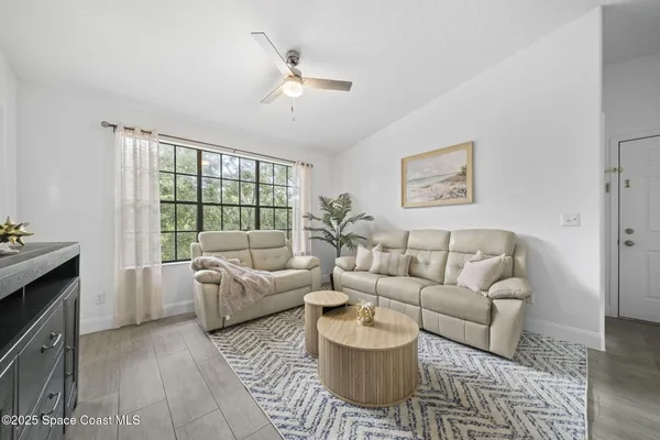 a view of a kitchen with granite countertop lots of counter top space and furniture
