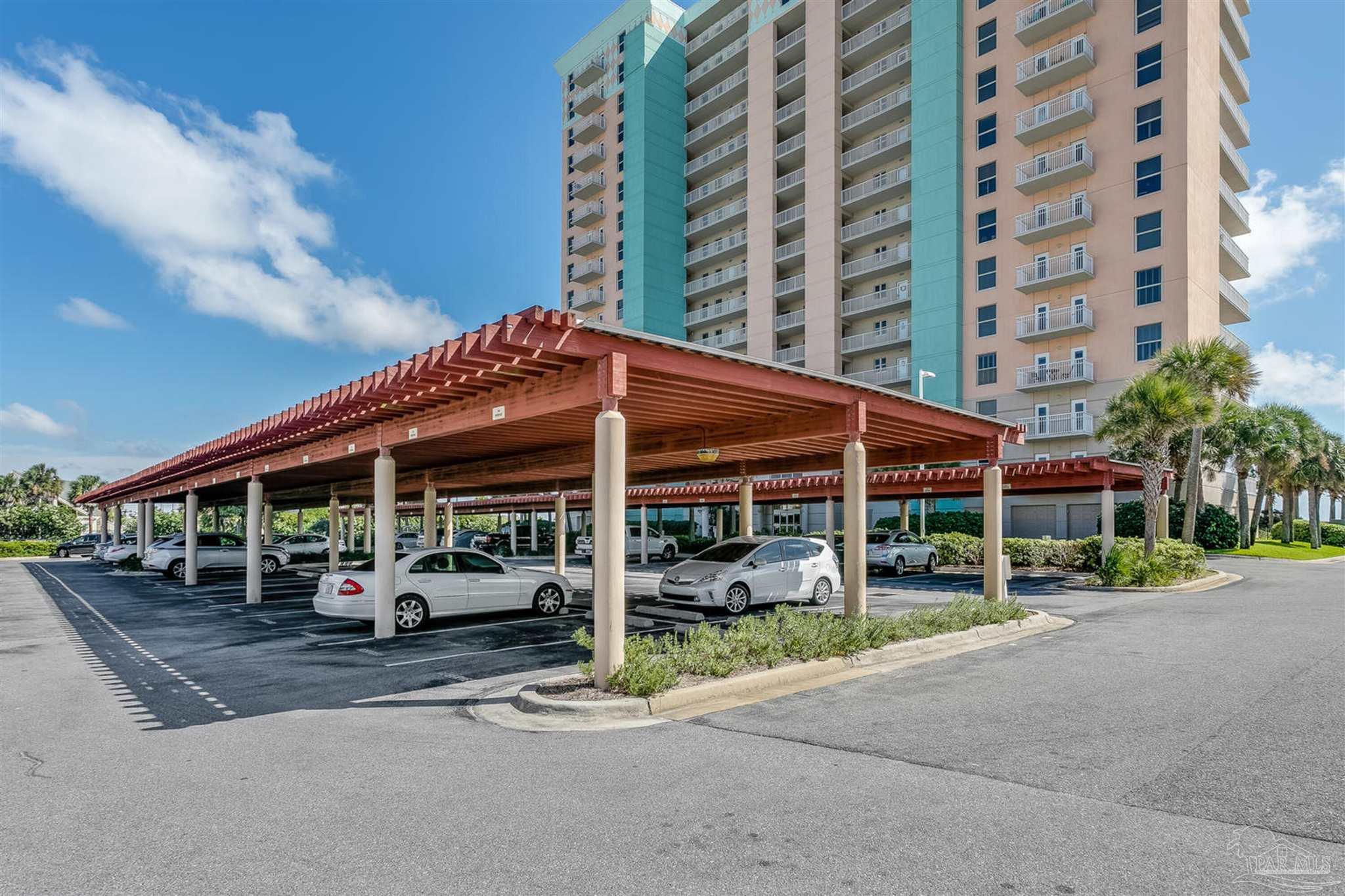 800 Fort Pickens Road, Unit 204 Pensacola Beach, FL 32561 - Photo 38 of 45 a car parked in front of building