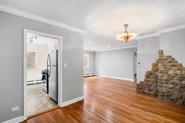 a view of livingroom with furniture and wooden floor