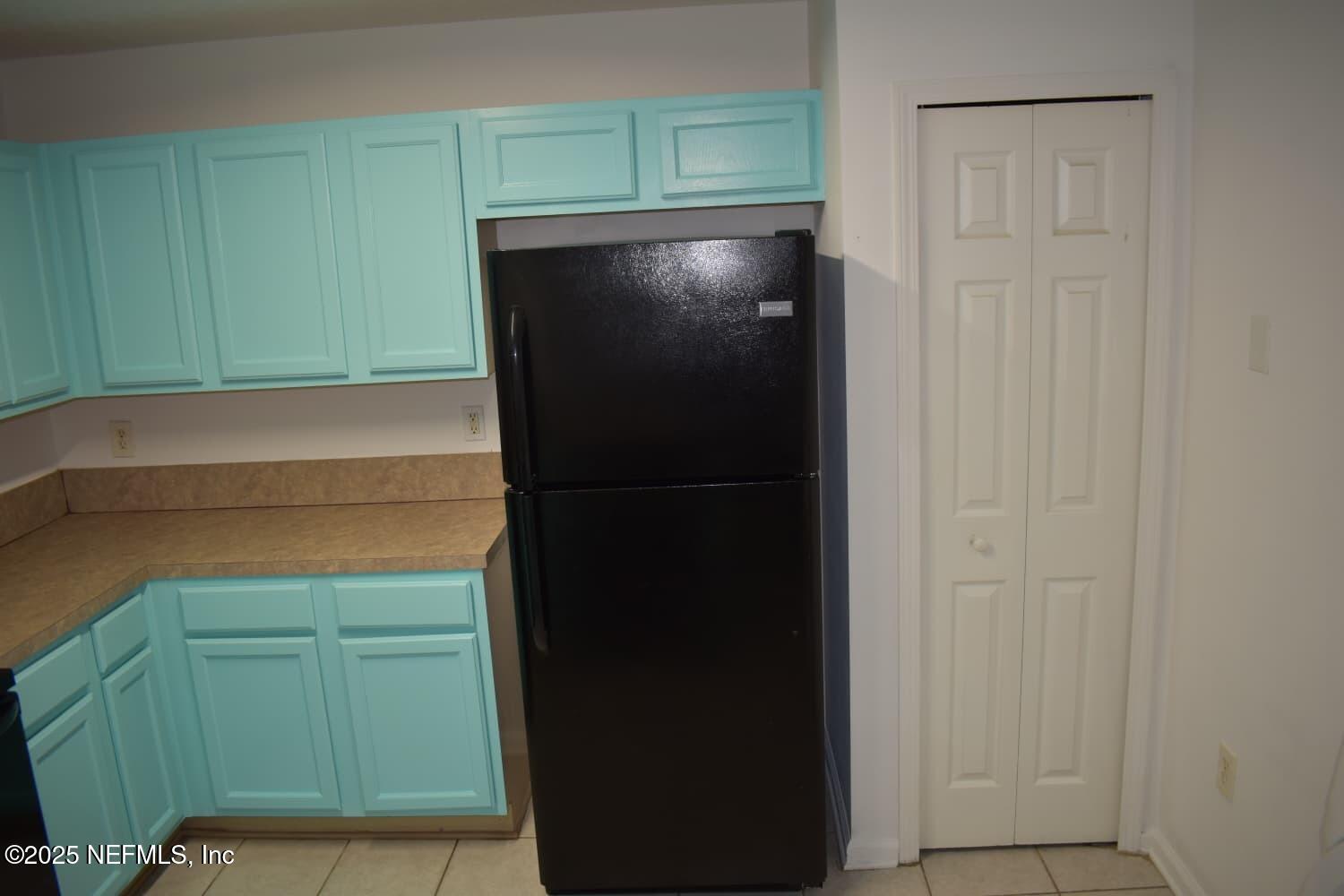 7920 Merrill Road, Unit 1710 Jacksonville, FL 32277 - Photo 15 of 51 a close view of wooden cabinets