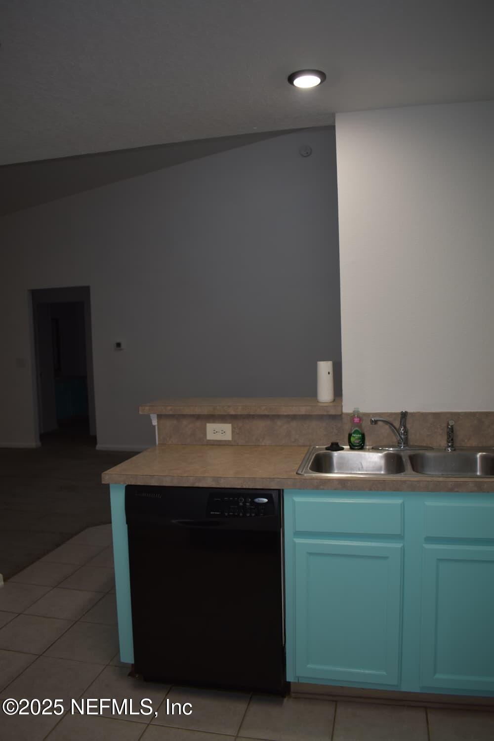 7920 Merrill Road, Unit 1710 Jacksonville, FL 32277 - Photo 16 of 51 a bathroom with a sink and a mirror