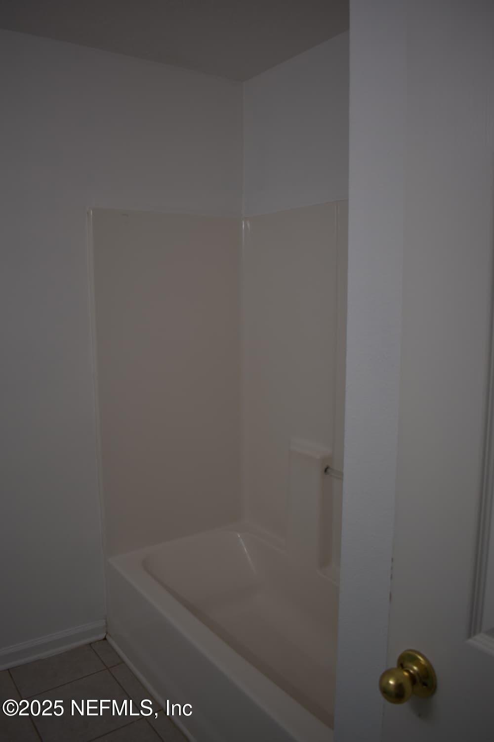 7920 Merrill Road, Unit 1710 Jacksonville, FL 32277 - Photo 29 of 51 a bathroom with a shower