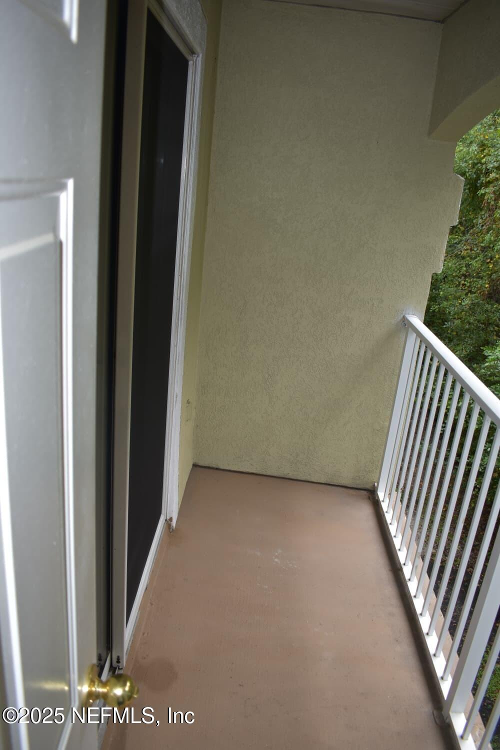 7920 Merrill Road, Unit 1710 Jacksonville, FL 32277 - Photo 40 of 51 a view of a room with a staircase