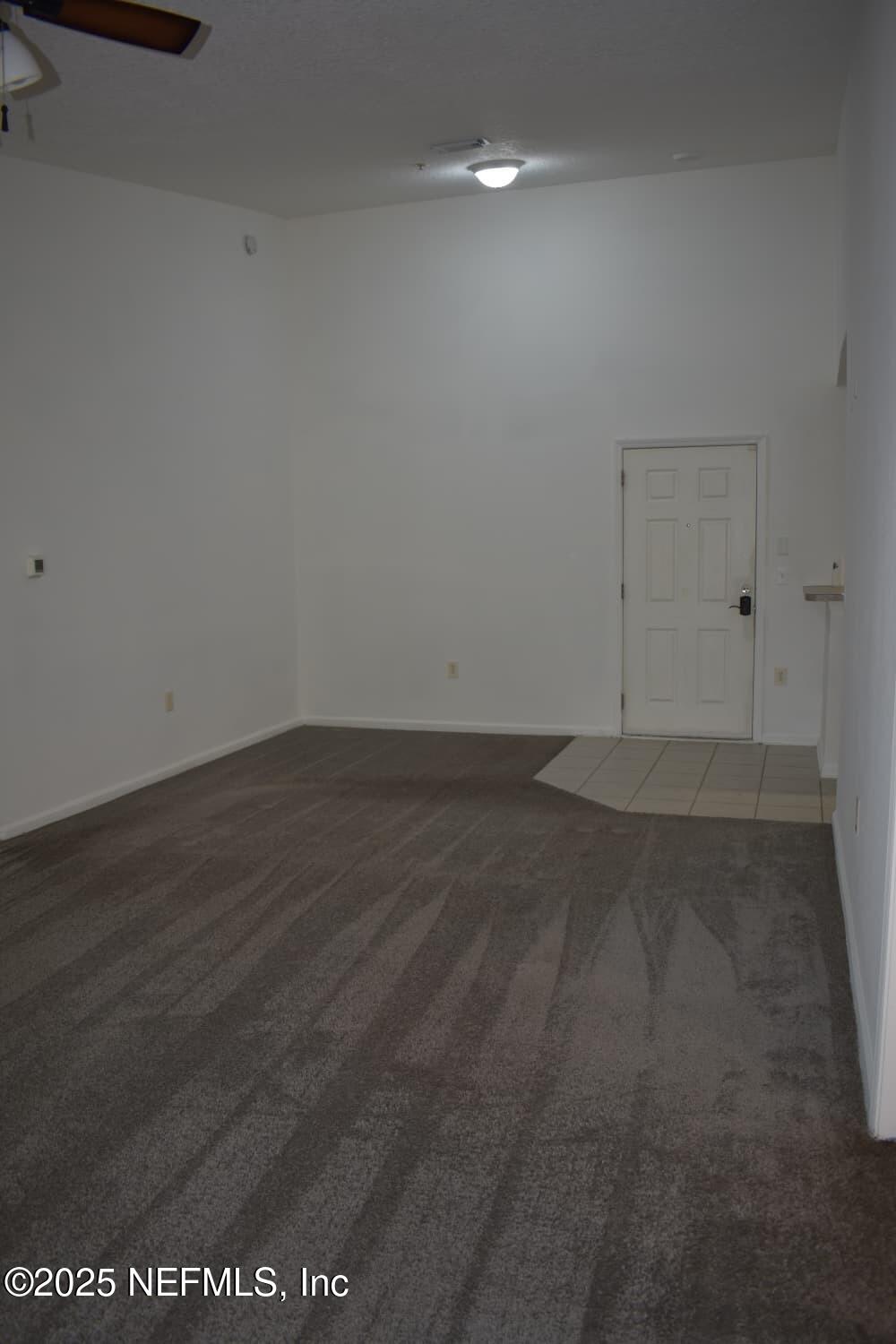 7920 Merrill Road, Unit 1710 Jacksonville, FL 32277 - Photo 7 of 51 a view of an empty room