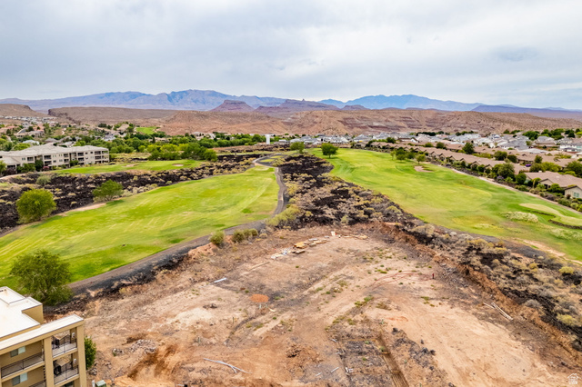 271 North Country Lane, Unit 60 St. George, UT 84770 - Photo 15 of 17 View of mountain backdrop with a local golf course and nearby suburban area