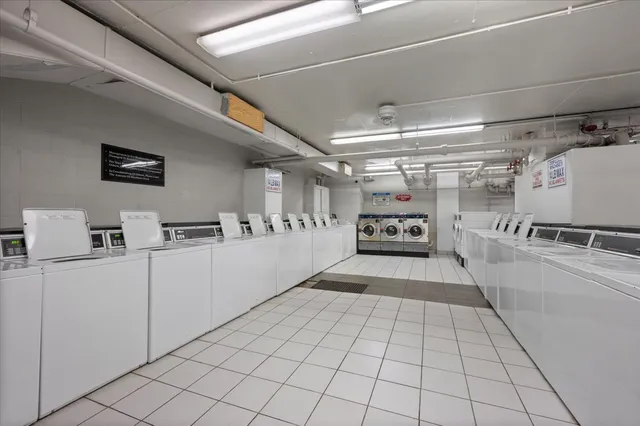a view of swimming pool with outdoor seating