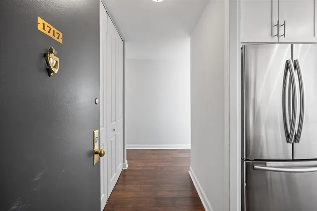 a view of a storage & utility room with closet