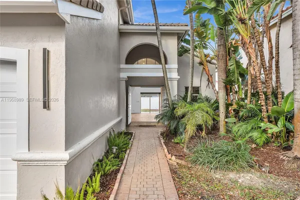 a house view with a outdoor space