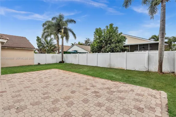 a house with garden in front of it
