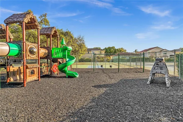 a view of a park with slide