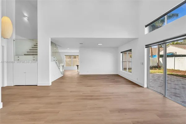 a view of an empty room and window