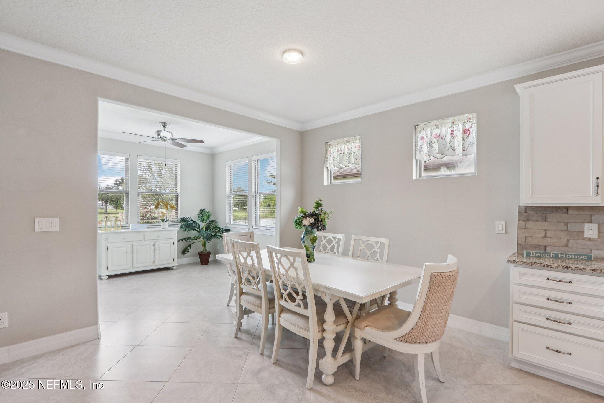112 Bridge Oak Lane St. Augustine, FL 32095 - Photo 14 of 47 a dining room with furniture and window