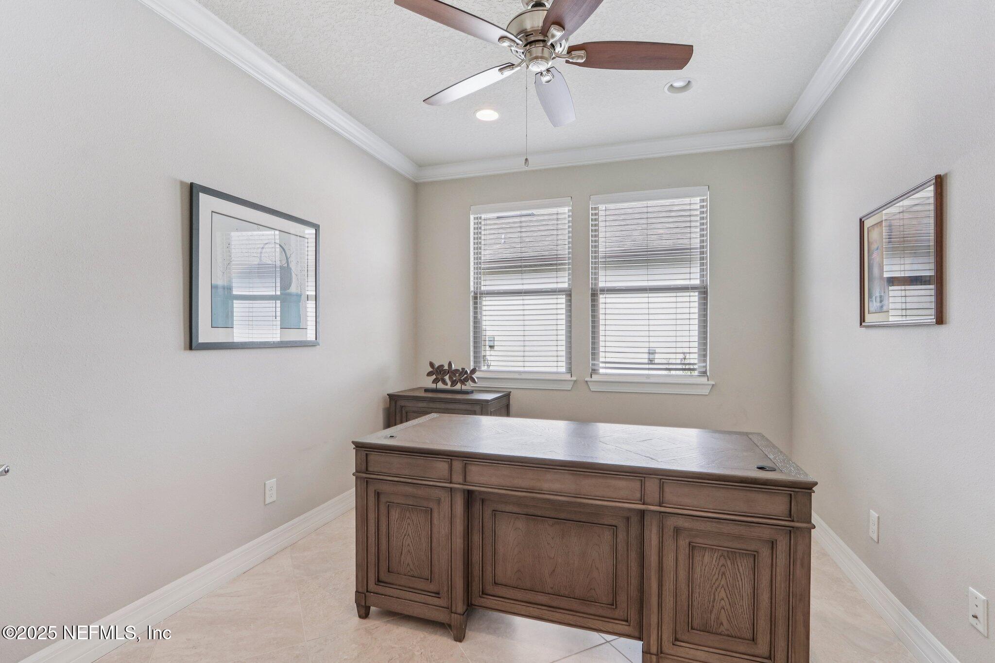112 Bridge Oak Lane St. Augustine, FL 32095 - Photo 24 of 47 a bathroom with a granite countertop sink a large mirror and a window