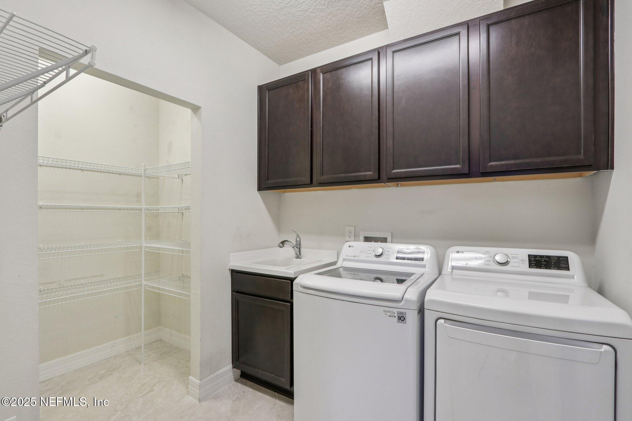 112 Bridge Oak Lane St. Augustine, FL 32095 - Photo 29 of 47 a utility room with dryer and washer