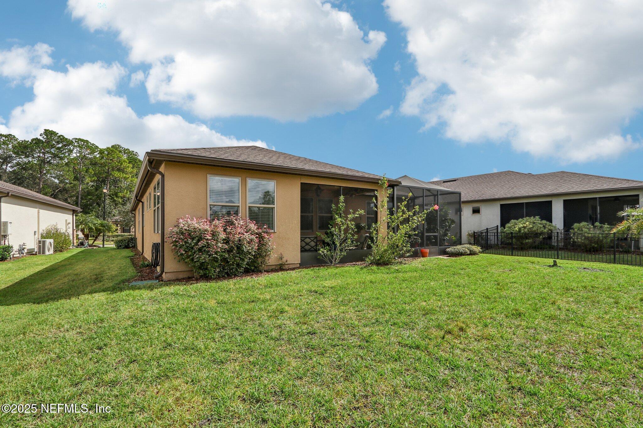 112 Bridge Oak Lane St. Augustine, FL 32095 - Photo 43 of 47 a view of a house with backyard and garden