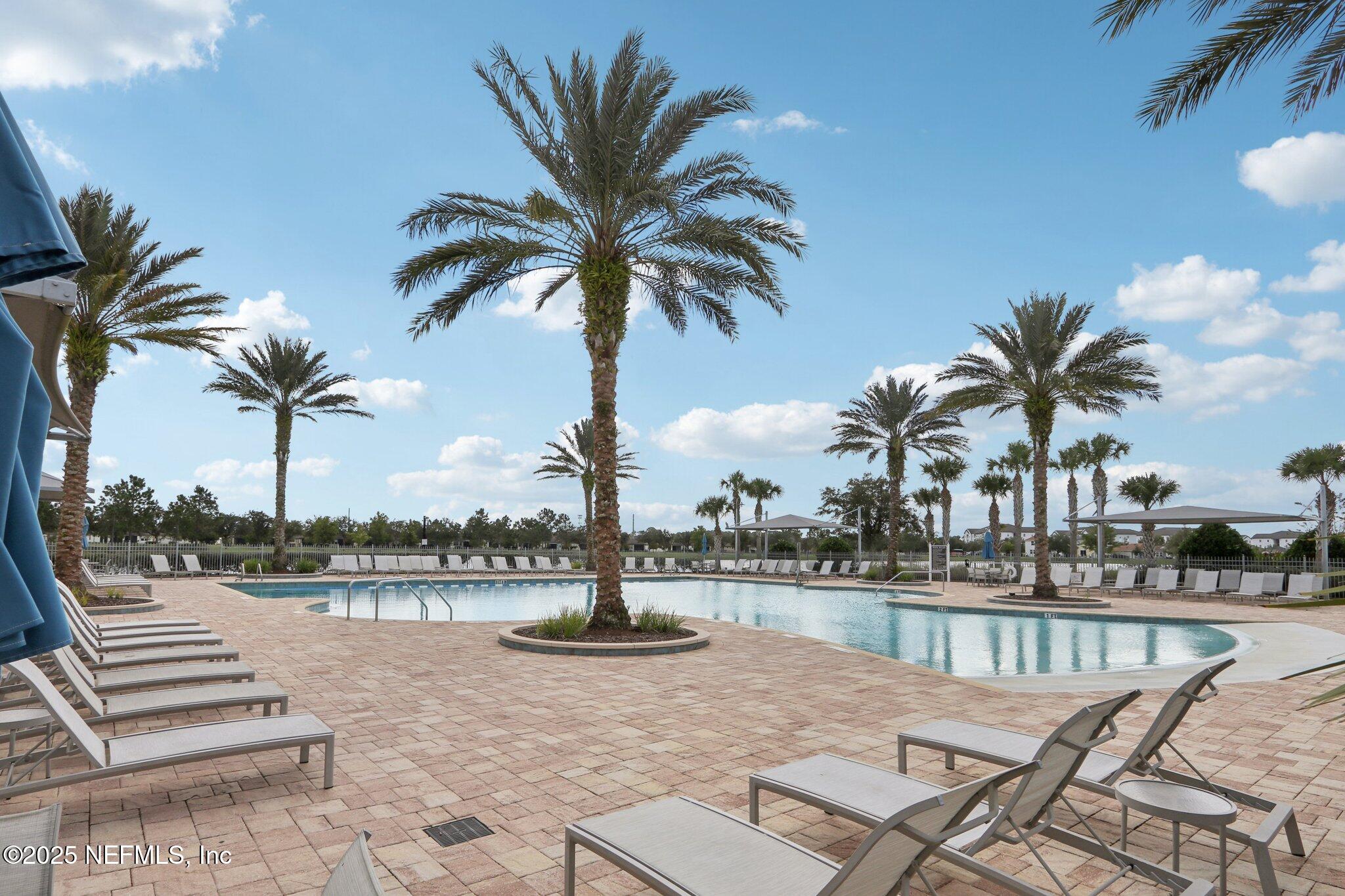 112 Bridge Oak Lane St. Augustine, FL 32095 - Photo 44 of 47 a view of swimming pool with outdoor seating